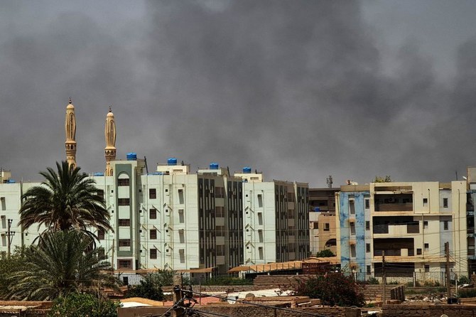 Smoke billows in Sudan's capital Khartoum on May 27, 2023, five days into a one-week ceasefire. (AFP)