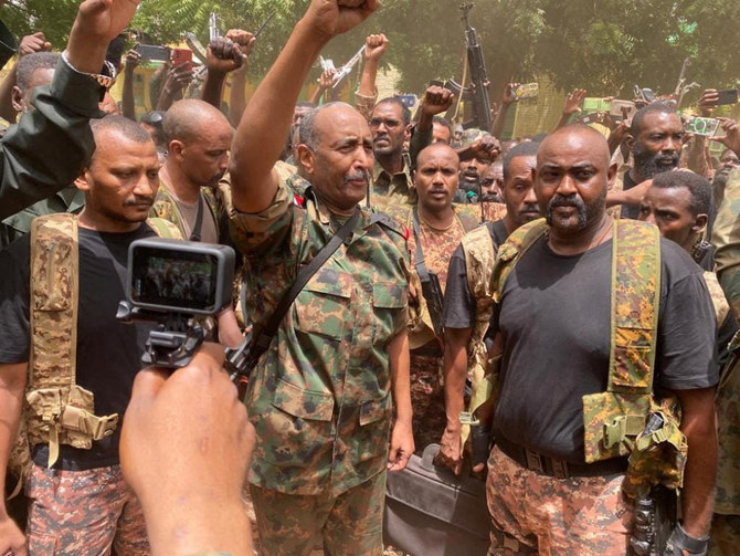 Sudan's General Abdel Fattah al-Burhan stands among troops,in an unknown location, in this picture released on May 30, 2023. (Sudanese Armed Forces/Handout via Reuters)