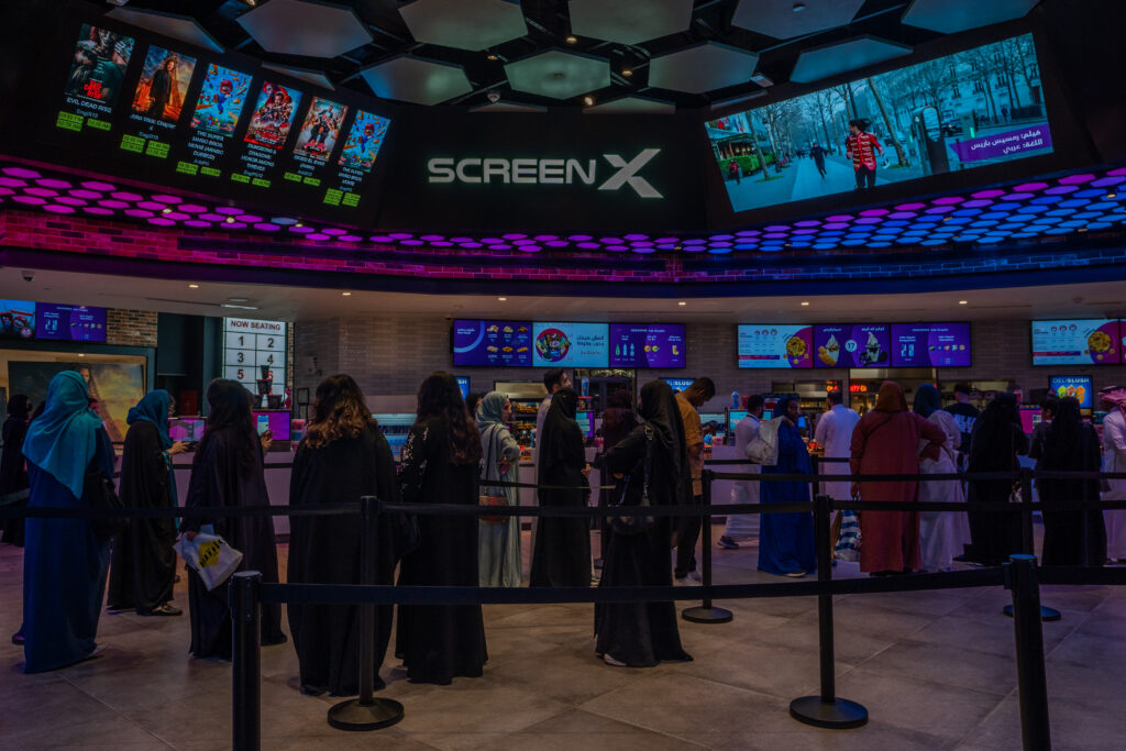 People lining up to buy snacks and beverages before watching the movie. (ANJ)