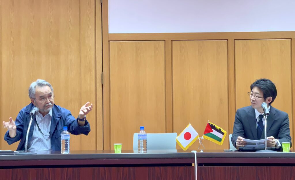 DOI Toshikuni, a Japanese journalist and professor, delivering a lecture on 