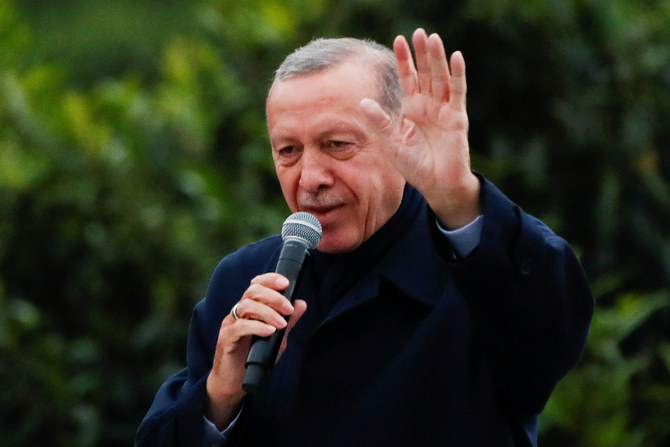 Turkish President Tayyip Erdogan addresses his supporters following early exit poll results for the second round of the presidential election in Istanbul. (Reuters)