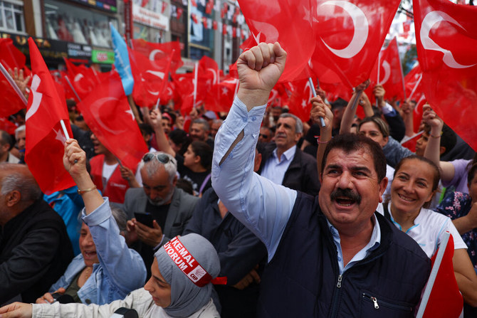 Supporters of the main opposition Republican People’s Party (CHP) wave flags during an election rally, ahead of the May 28 presidential runoff vote, in Istanbul on May 27, 2023. (Reuters)