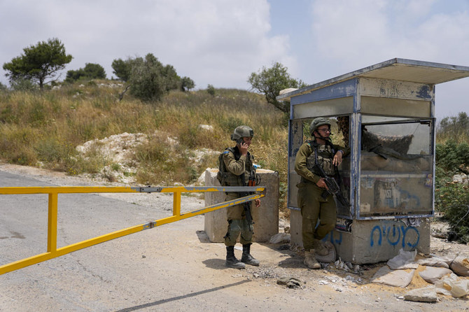 Some 700,000 Israelis now live in settlements in the West Bank and east Jerusalem, and settlers have rebuilt an outpost at Homesh, above, after Israel’s far-right government repealed a 2005 act that had dismantled it. (AP)