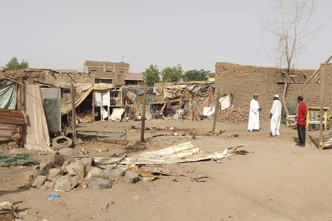People check the rubble of their destroyed home after strikes at Allamat district in Khartoum, Sudan, Thursday, June 1, 2023. The White House says it's imposing sanctions against key defense companies and people who “perpetuate violenceâ€' in Sudan as the warring sides fail to abide by a cease-fire agreement in the northeastern African nation. (AP Photo)