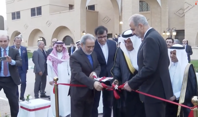 Saudi and Iranian officials cut the ribbon at the reopening ceremony of Tehran’s embassy in Riyadh on Tuesday. (AFP)