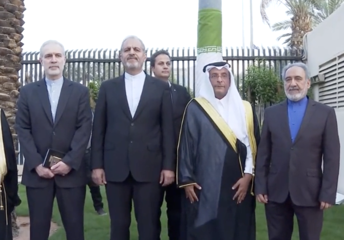 Saudi and Iranian officials pose for a photo at the reopening ceremony of Tehran’s embassy in Riyadh on Tuesday. (AFP)