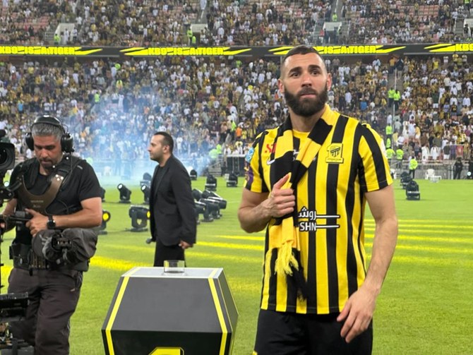 Over 50,000 Al-Ittihad fans turned out to catch the first glimpse of Karim Benzema wearing his new black and yellow, number 9 jersey at King Abdullah Sports City Stadium on Thursday. (AN Photo/Hashim Nadeem)