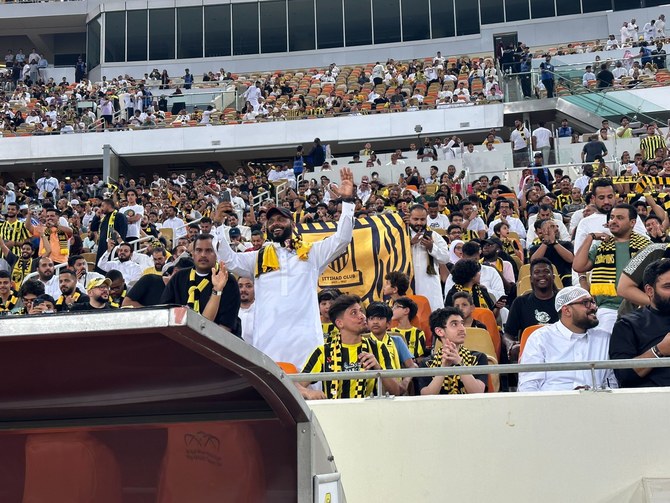 Over 50,000 Al-Ittihad fans turned out to catch the first glimpse of Karim Benzema wearing his new black and yellow, number 9 jersey at King Abdullah Sports City Stadium on Thursday. (AN Photo/Hashim Nadeem)