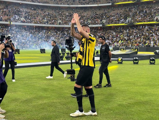 Over 50,000 Al-Ittihad fans turned out to catch the first glimpse of Karim Benzema wearing his new black and yellow, number 9 jersey at King Abdullah Sports City Stadium on Thursday. (AN Photo/Hashim Nadeem)