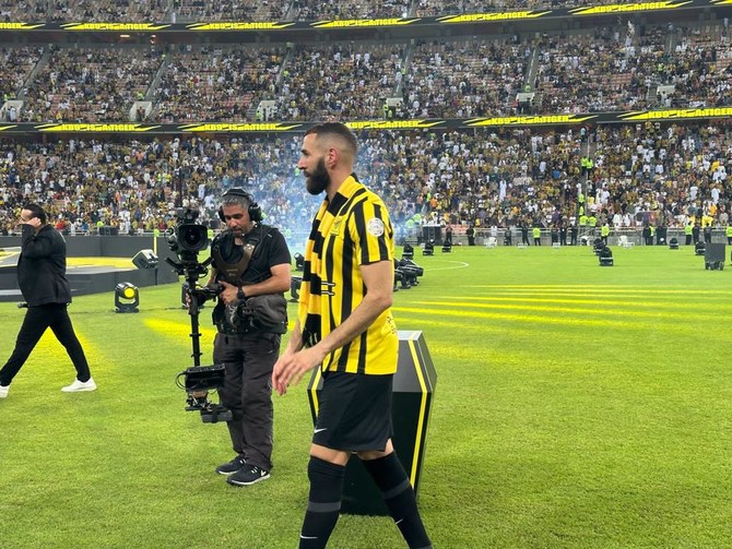 Over 50,000 Al-Ittihad fans turned out to catch the first glimpse of Karim Benzema wearing his new black and yellow, number 9 jersey at King Abdullah Sports City Stadium on Thursday. (AN Photo/Hashim Nadeem)