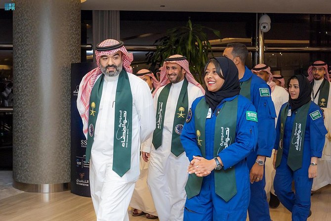 Officials welcome the Saudi astronauts at King Khaled International Airport. (SPA)