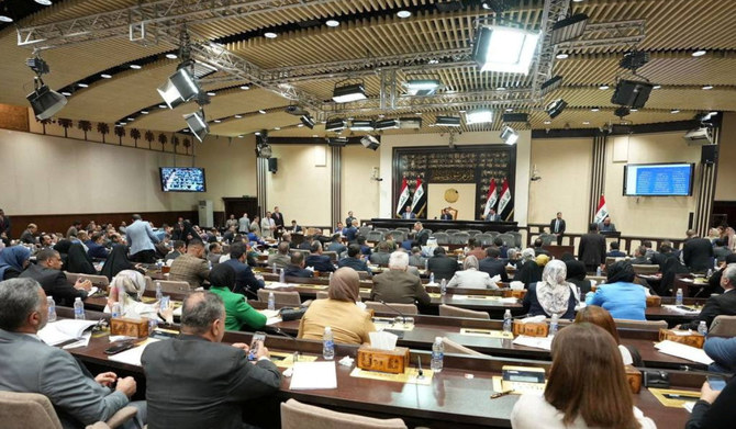 Iraqi lawmakers attend a parliamentary session to vote on the federal budget at the parliament headquarters in Baghdad, Iraq, June 11, 2023. (REUTERS)