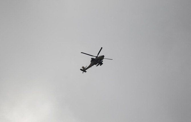 A helicopter flies during an Israeli raid in Jenin, in the Israeli-occupied West Bank June 19, 2023. (Reuters)