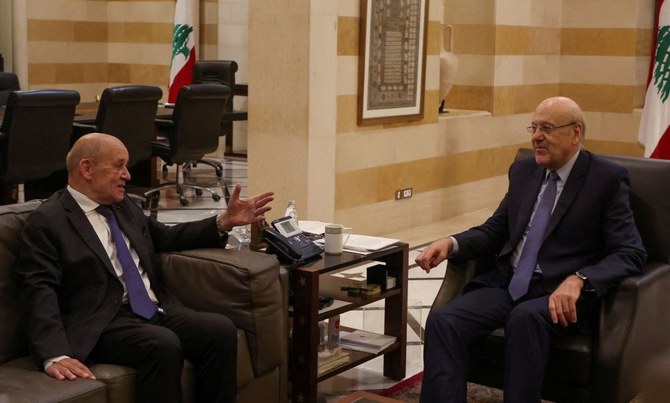 Lebanon’s caretaker Prime Minister Najib Mikati meets with former French Foreign Minister Jean-Yves Le Drian in Beirut, Lebanon, June 22, 2023. (Reuters)