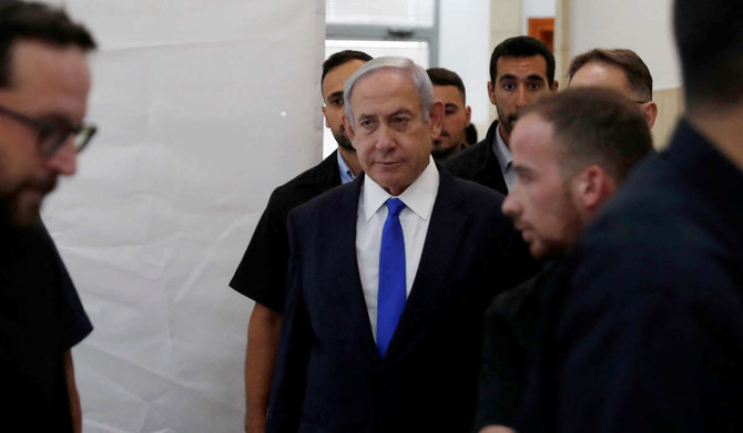 Israeli PM Benjamin Netanyahu attends Arnon Milchan's video testimony, during Netanyahu's ongoing trial at the District Court in Jerusalem, June 25, 2023. (REUTERS)