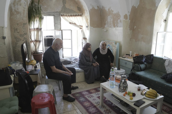 ora, right, and Mustafa Ghaith-Sub Labans, seen in their home in the Muslim Quarter of the Old City of Jerusalem, have been ordered evicted by Israeli authorities by July 13. (AP)