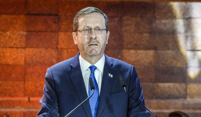 Israel's President Isaac Herzog delivers a speech during the opening ceremony of the Holocaust Martyrs and Heroes Remembrance Day at Yad Vashem Holocaust Museum in Jerusalem, Monday, April 17, 2023. (AP)