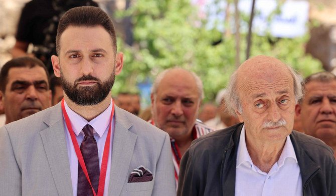 Taymur (L) and his father Walid Jumblatt attend a gathering in Ain Zhalta on June 25, 2023, where Taymur was chosen to succeeded his father as the new leader of the Progressive Socialist Party (PSP). (AFP)