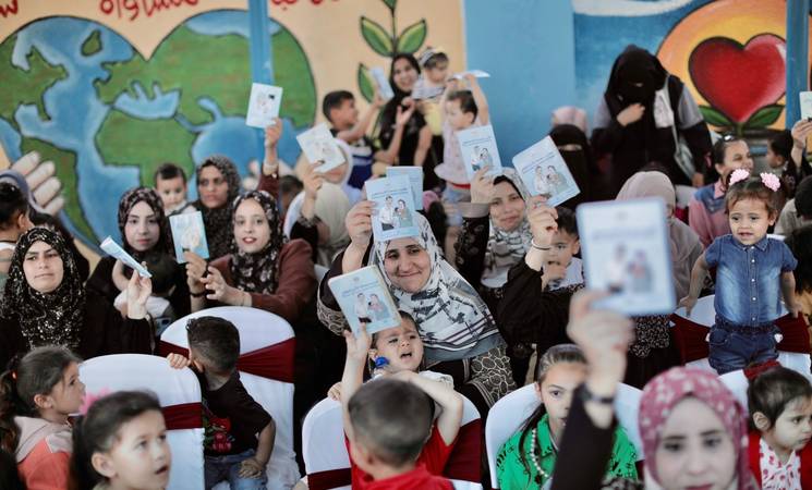 Some 100 mothers and children attended the event at the UNRWA Khan Younis Health Centre. (Courtesy of UNRWA)