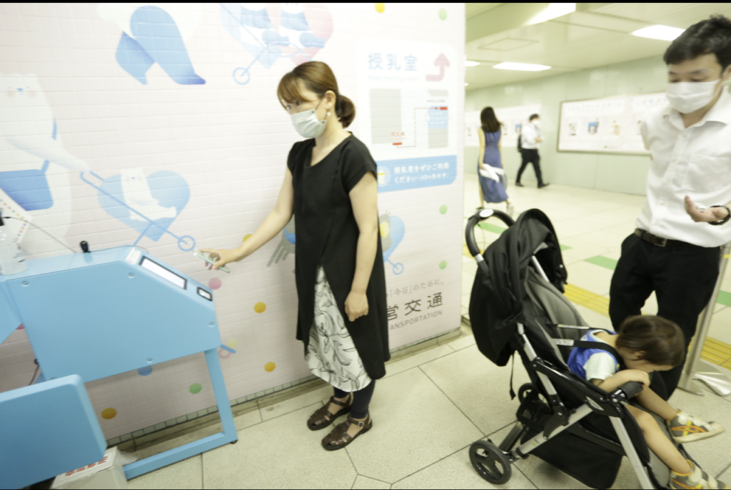 Mother use the first baby care rental service by QR code in Ueno Okashimachi on Tokyo Oedo line managed by bureau of transportation of Tokyo metropolitan government.( ANJ /PIERRE BOUTIER )