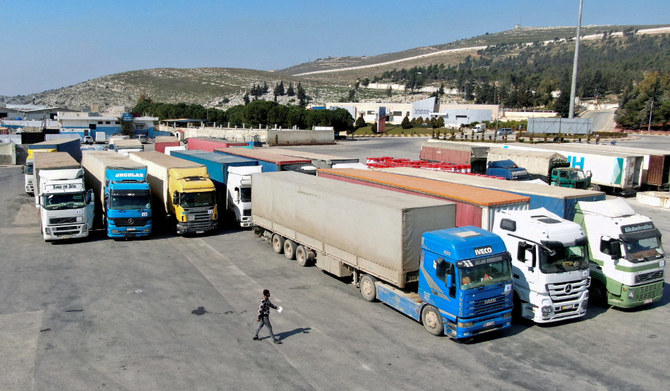 Trucks carrying aid from the UN World Food Programme, following a deadly earthquake, are parked at Bab al-Hawa, Feb. 20, 2023. (REUTERS/File Photo)