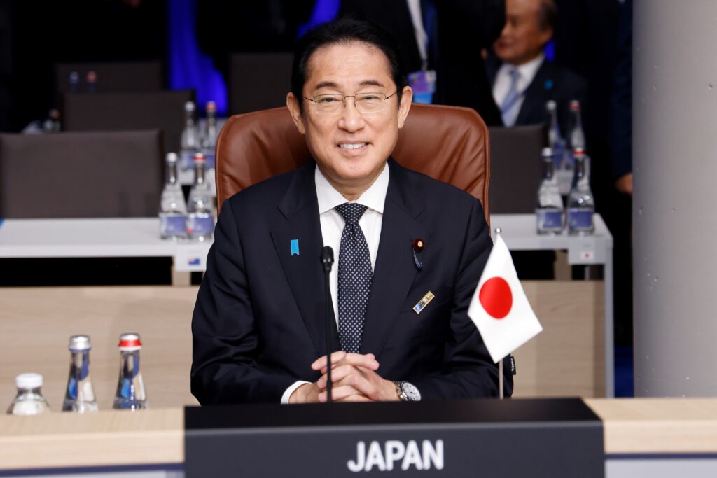 Japan's Prime Minister Fumio Kishida waits before the start of a meeting with NATO's Indo-Pacific partners during the NATO summit, in Vilnius on July 12, 2023. (AFP)