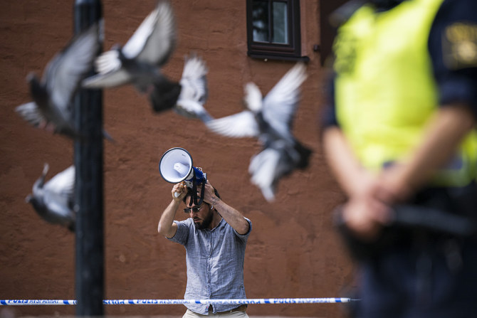 On June 28, Salwan Momika, 37, a refugee from Iraq, desecrated the Qur’an and set fire to its pages in front of the Central Mosque in Stockholm. (AFP)