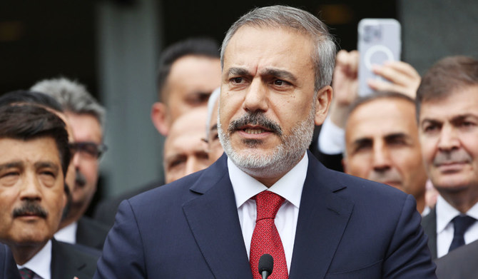 Turkiye's newly appointed Foreign Affairs Minister Hakan Fidan delivers a speech during a handover ceremony in Ankara on June 5, 2023. (AFP)