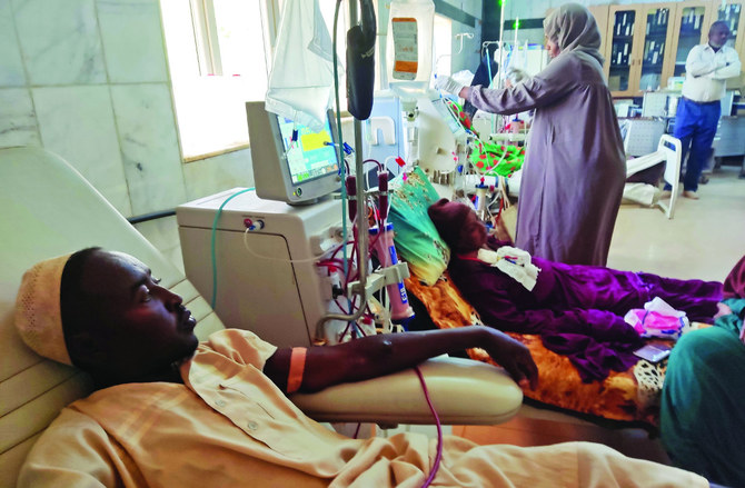 The conflict in Sudan has left more than 12,000 dialysis patients, pictured (main) at the Soba Hospital in southern Khartoum, at grave risk as hospitals across the country have run out of medications. (AFP)