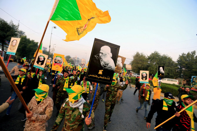 Kataib Hezbollah Iraqi militia gather ahead of the funeral of the Iraqi militia commander Abu Mahdi al-Muhandis, who was killed in an air strike at Baghdad airport in Iraq, January 4, 2020. (REUTERS/File Photo)