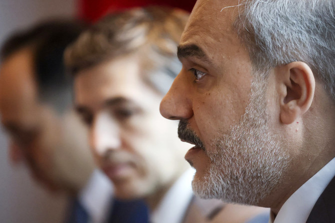 Turkey's Foreign Minister Hakan Fidan (R) talks during a meeting with US Secretary of State Antony Blinken (unseen) on the first day of the Ukraine Recovery Conference in London on June 21, 2023. (AFP)