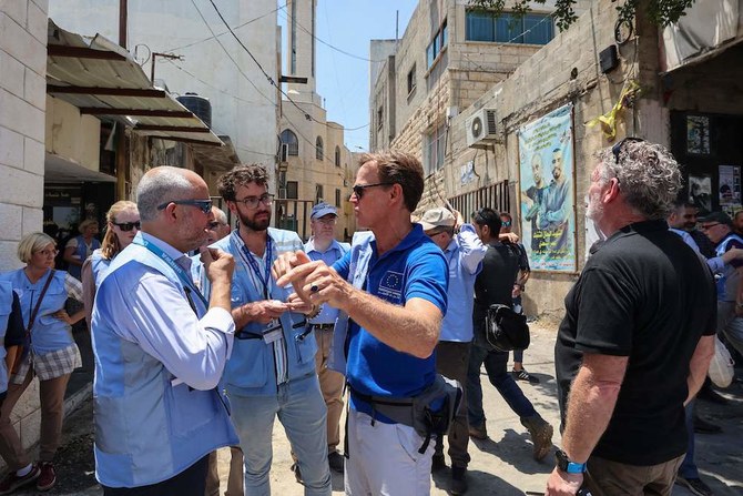 EU representative to the Palestinian territories Sven Kuehn von Burgsdorff (C R) visits the Jenin refugee camp in the West Bank on July 8, 2023. (AFP)
