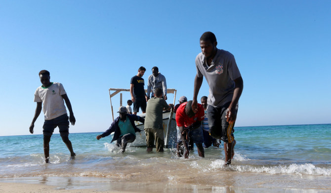 Migrants are seen after being rescued by Libyan coast guard in Tripoli, Libya July 26, 2019. (REUTERS)