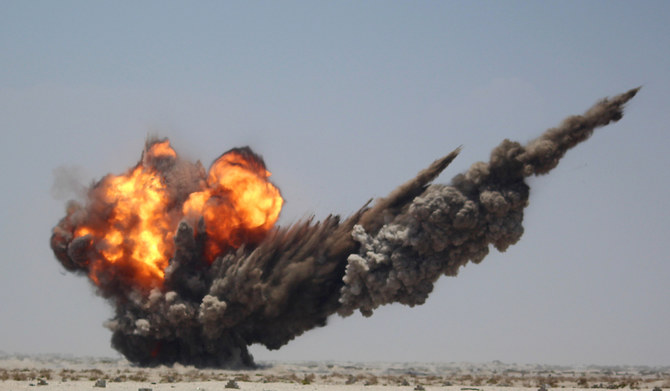 This file photo taken on April 05, 2016 shows smoke and fire billowing during a controlled explosion by Yemeni experts to destroy explosives and mines laid by Huthi rebels, in the southern city of Aden. (AFP)