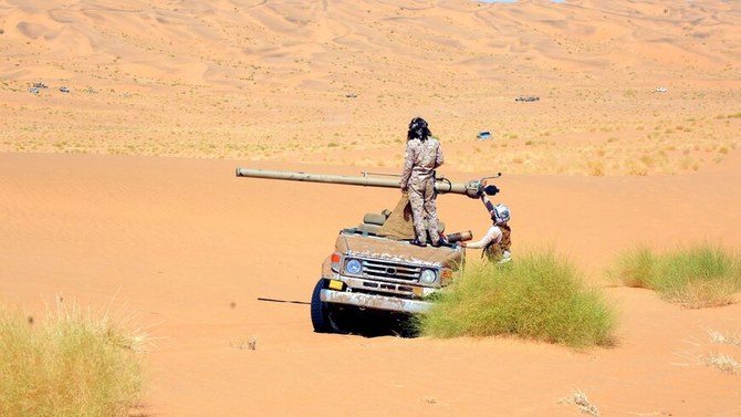 Fighters loyal to Yemen’s government man a car-mounted recoilless rifle at the Al-Jawba frontline facing Houthi militants in the province of Marib, Yemen, Jan. 14, 2022. (AFP)