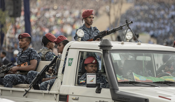 An Ethiopian Federal Police officers pass by during a ceremony of honoring members of the Federal Police Force in Addis Ababa, Ethiopia, on June 5, 2022. (AFP)