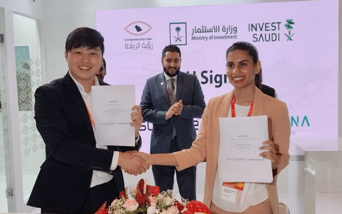 Prince Fahad bin Mansour (C) attends a signing ceremony between Singaporean firm Codesurance and Saudi company Healthgena in New Delhi, India at G20 YEA Summit on July 15, 2023. (AN photo)