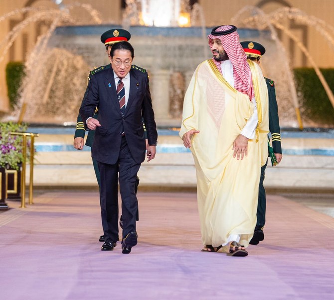 Saudi Arabia’s Crown Prince Mohammed bin Salman receives Japan’s Prime Minister Fumio Kishida at Al-Salam Palace in Jeddah on Sunday. (SPA)
