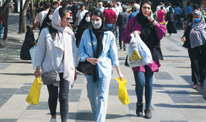 Social media is flooded with angry comments from Iranians criticizing the return of the morality police, who had largely vanished from streets since 22-year-old Mahsa Amini died in their custody. (AFP)