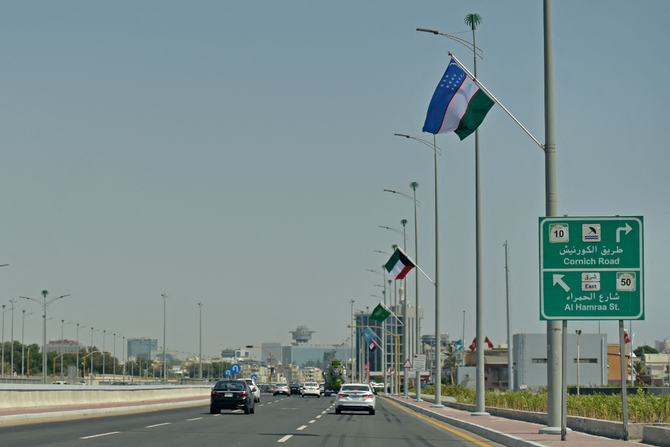Flags representing GCC and Central Asian nations are displayed along a road during the Gulf-Central Asia summit in Jeddah. (SPA)