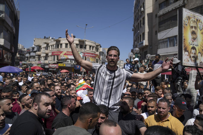 Israeli troops shot and killed a Palestinian near a shrine in the occupied West Bank on Thursday, Palestinian health officials said, in the latest bloodshed in a cycle of violence that has gripped the region. (AP)