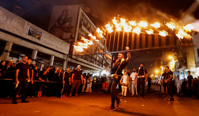 Shi'ite Muslims participate in a mourning ritual, amid high temperatures, ahead of Ashura, the holiest day of the Shi'ite Muslim calendar, in Baghdad, Iraq July 28, 2023. (REUTERS)