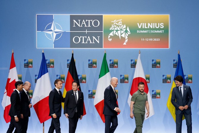 Leaders of the UK, Germany, France, Japan, US, Ukraine, and Canada leave at the end of an event to announce a Joint Declaration of Support for Ukraine. (AP)