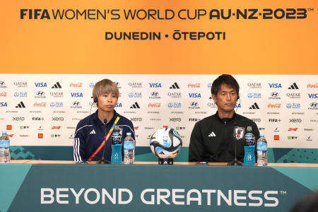 Japan's Mina Tanaka (left) and Japan's head coach Futoshi Ikeda listen to reporters' questions during a press conference ahead of their Women's World Cup Group C soccer match against Costa Rica. (AP)