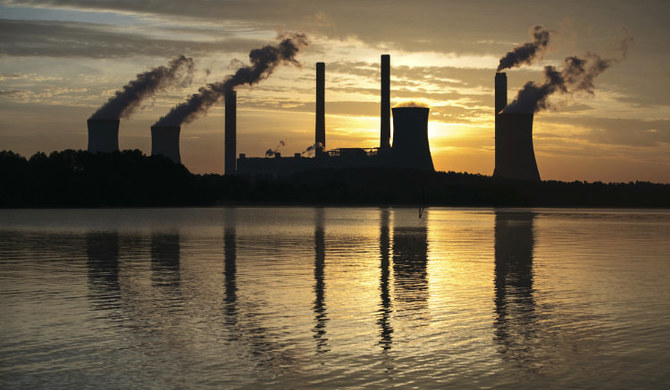 The coal-fired Plant Scherer stands in the distance in Juliette, Ga., on June 3, 2017. (AP)