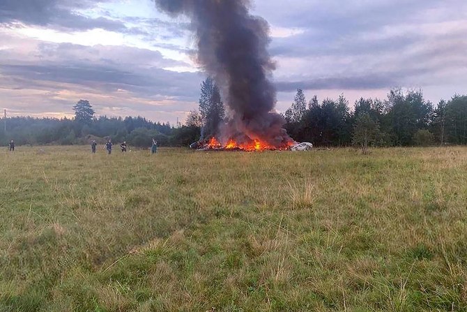 This photograph posted on a Wagner linked Telegram channel @grey_zone on August 23, 2023, shows a burning plane wreckage near the village of Kuzhenkino, Tver region. A private plane crashed in Moscow's Tver region and Wagner chief Yevgeny Prigozhin was on the list of passengers, Russian agencies said on August 23, 2023. (AFP/Telegram/@Grey_Zone)