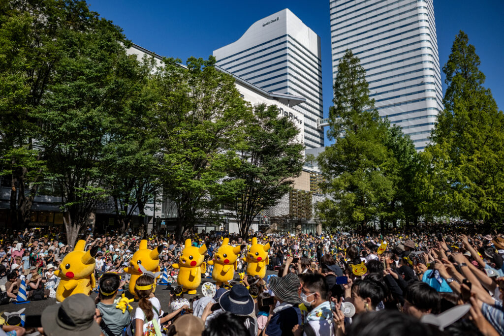 People watch the Pikachu parade which is a part of the 2023 Pokémon World Championships, at Grand Mall Park in Yokohama on August 11. (AFP)