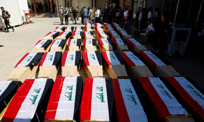Remains of people from the Yazidi minority, who were killed in Daesh attacks in 2014, after they were exhumed from a mass grave, in Mosul, Iraq June 20, 2023. (Reuters/File)