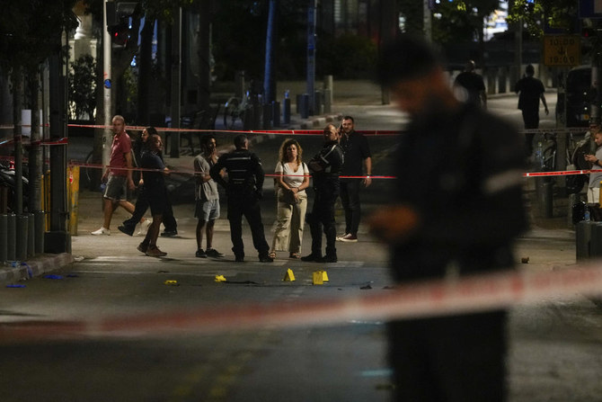 Israeli police inspect the site of a shooting attack in Tel Aviv on Aug. 5, 2023. (AP)