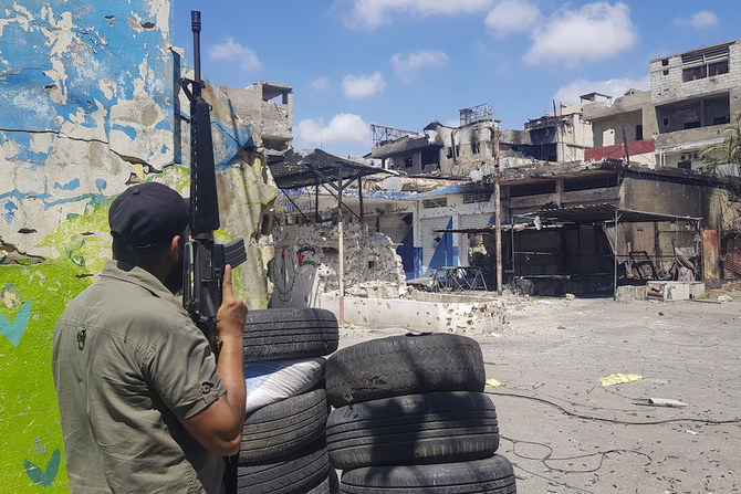 Deadly clashes erupted between Palestinian factions in the Ain El-Hilweh refugee camp near the southern city of Sidon, Lebanon, Aug. 3, 2023. (AP)